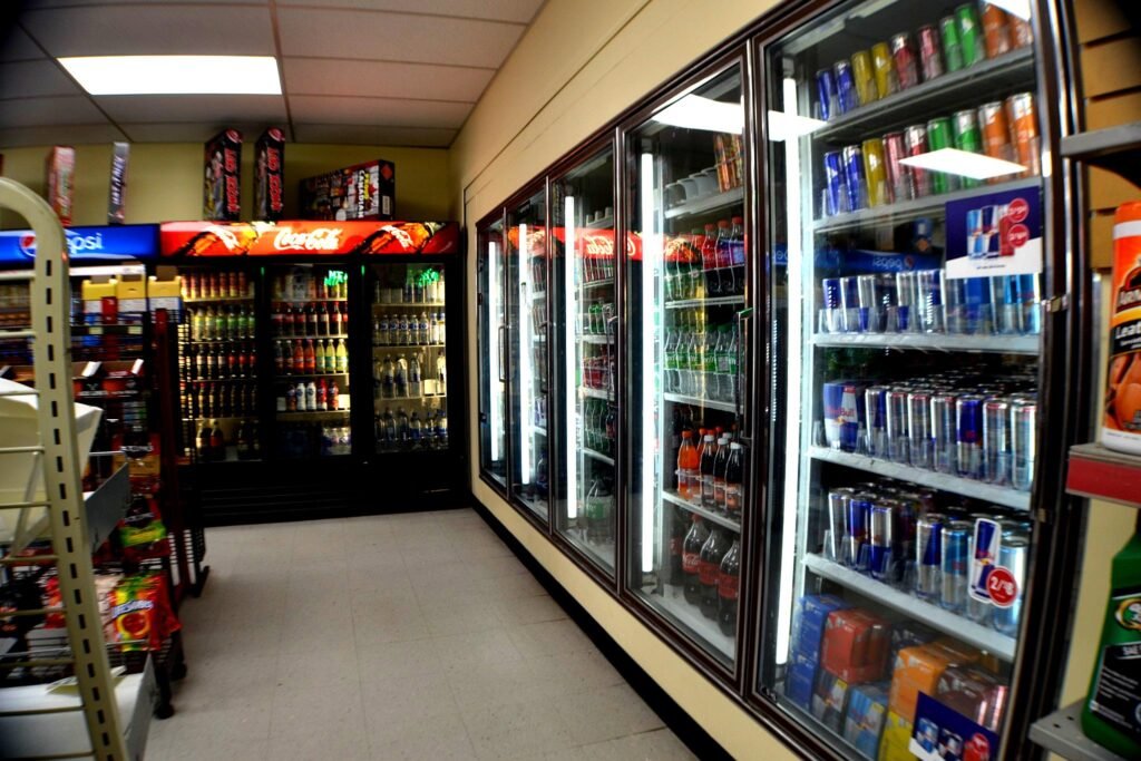 Convenience store aisle and refrigerated display cases