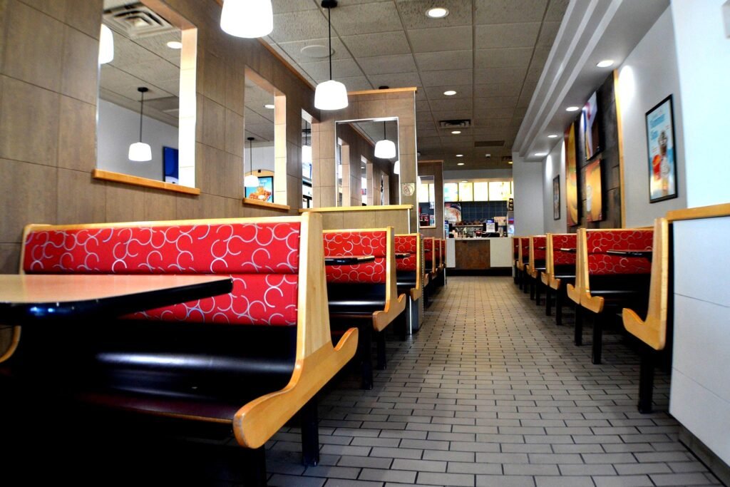 Tiled aisle between restaurant booths